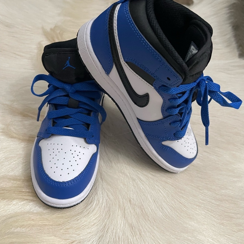 Kids Blue and Black Jordan AJ 1 Mid Sneakers